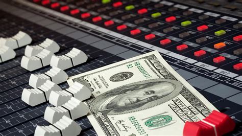 how do music producers make money